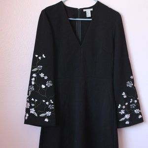 Black bell sleeved dress